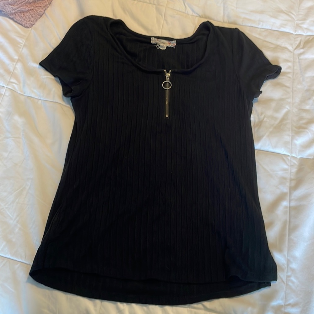 A black T-shirt with a zipper